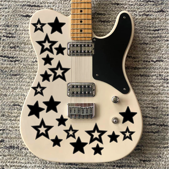 Наклейка звездочки на гитару